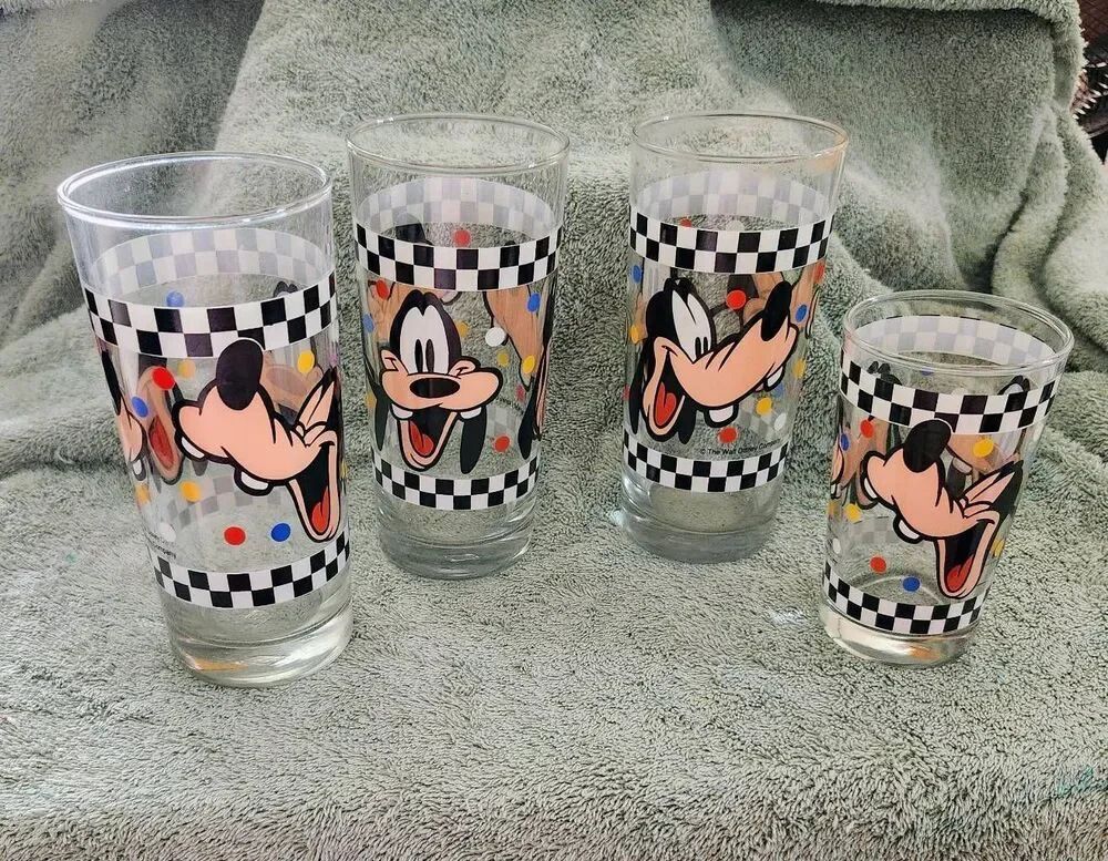 This is a set of vintage Goofy drinking glasses manufactured by Anchor Hocking f